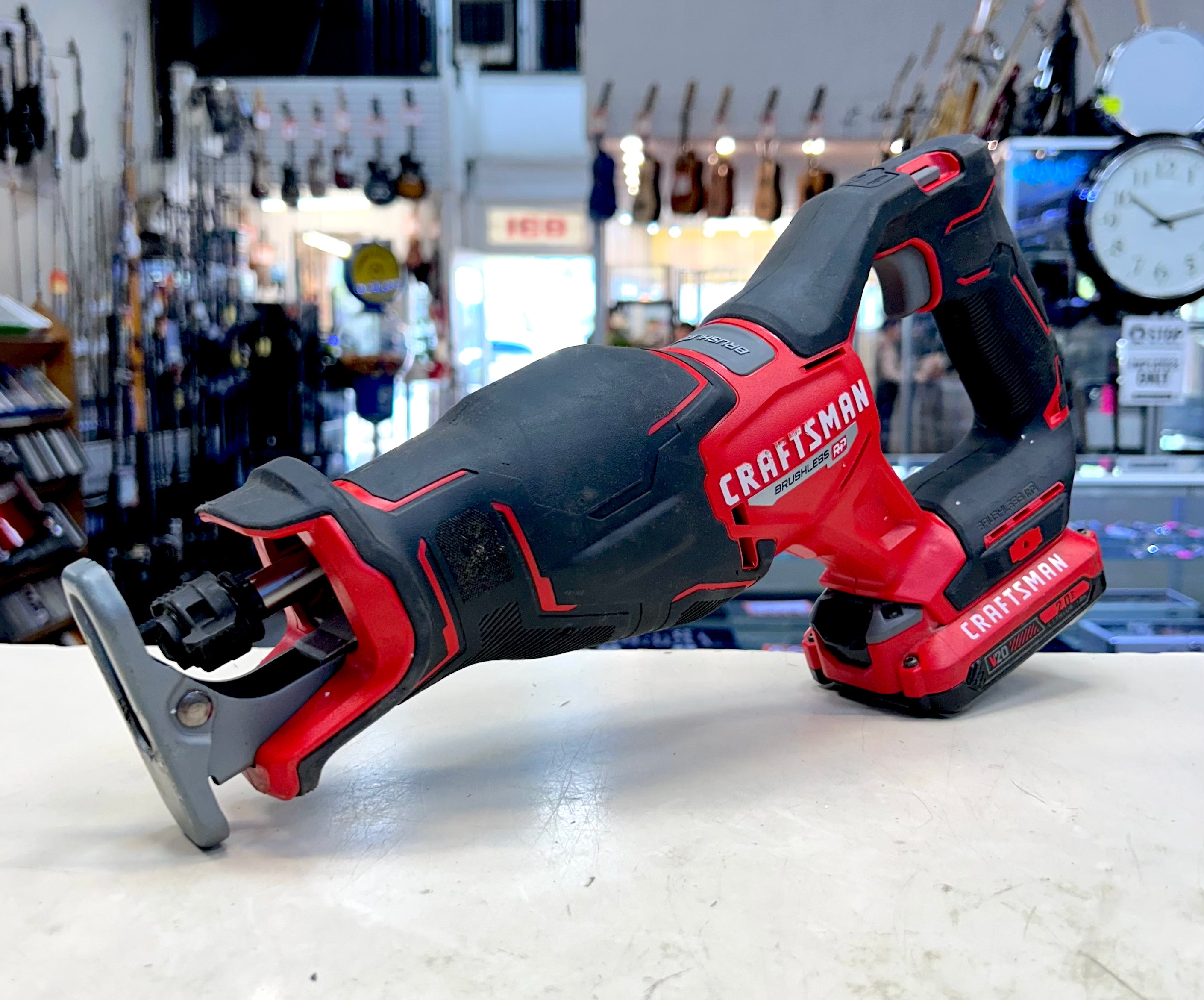 Craftsman power tool on a counter with a store background