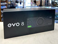 Black box with 'evo 8' branding on a light surface