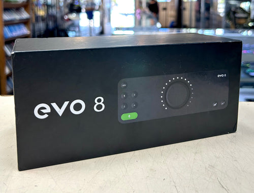Black box with 'evo 8' branding on a light surface