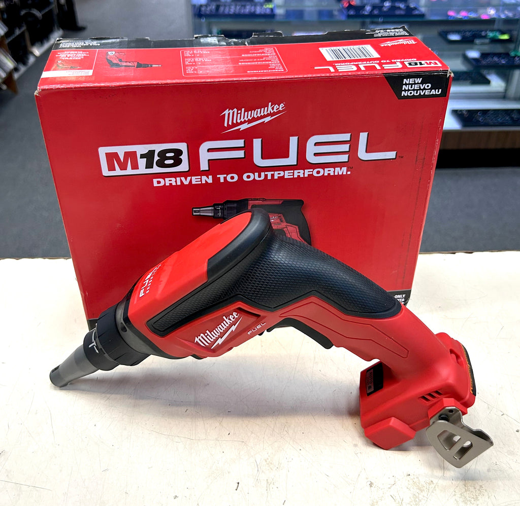 Red Milwaukee tool with M18 FUEL branding in front of a matching box.