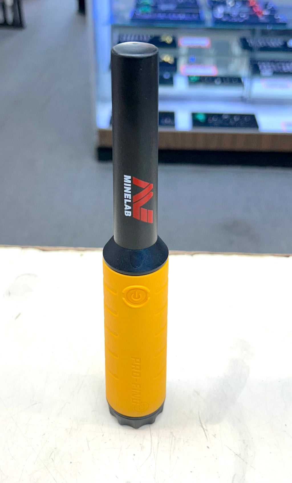 Black and yellow tool with a brand logo on a blurred background