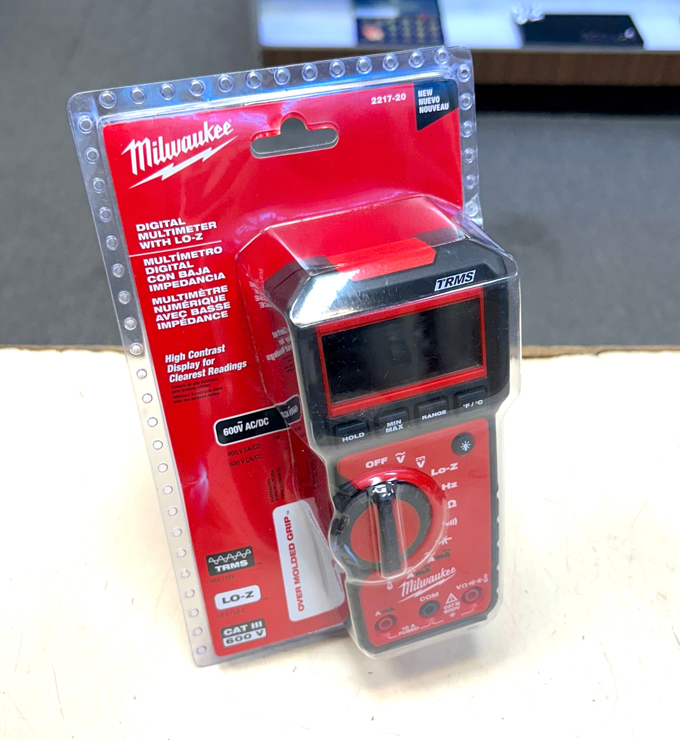 Milwaukee digital multimeter in packaging on a gray surface
