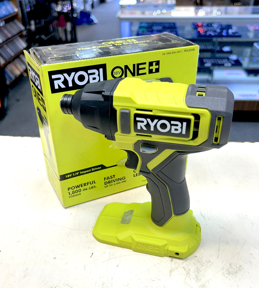 Ryobi power tool with packaging on a white surface
