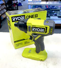 Ryobi power tool with packaging on a white surface