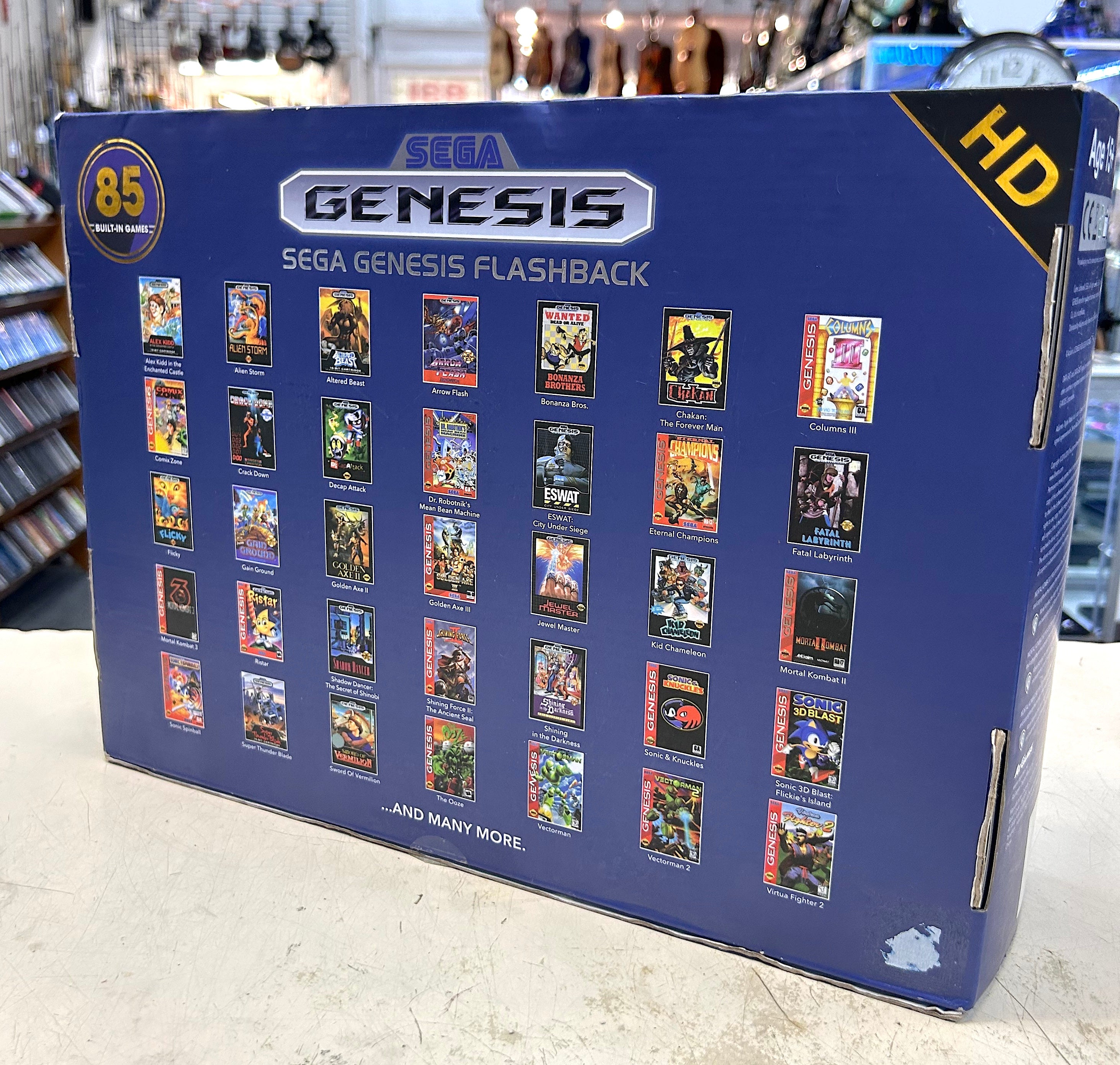 Sega Genesis Flashback HD packaging with multiple game covers on a blue background